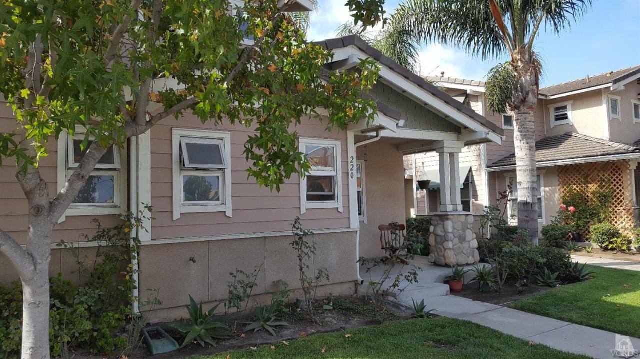 220 East 7th Street Oxnard, CA 93030 - Photo 3 of 9 front view of house with a yard and potted plants