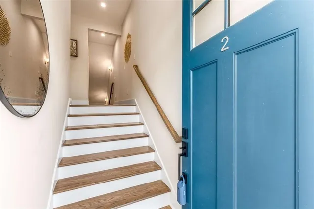 a view of a mirror and stairs