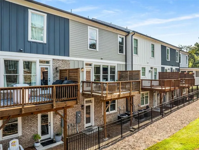 a front view of a house with glass windows