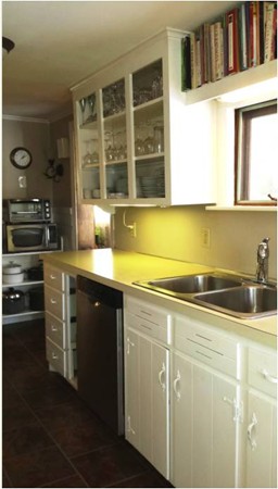 42 Boston Road Andover, MA 01810 - Photo 7 of 23 a kitchen with a sink and cabinets