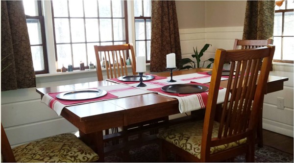 42 Boston Road Andover, MA 01810 - Photo 9 of 23 a room with furniture and two windows