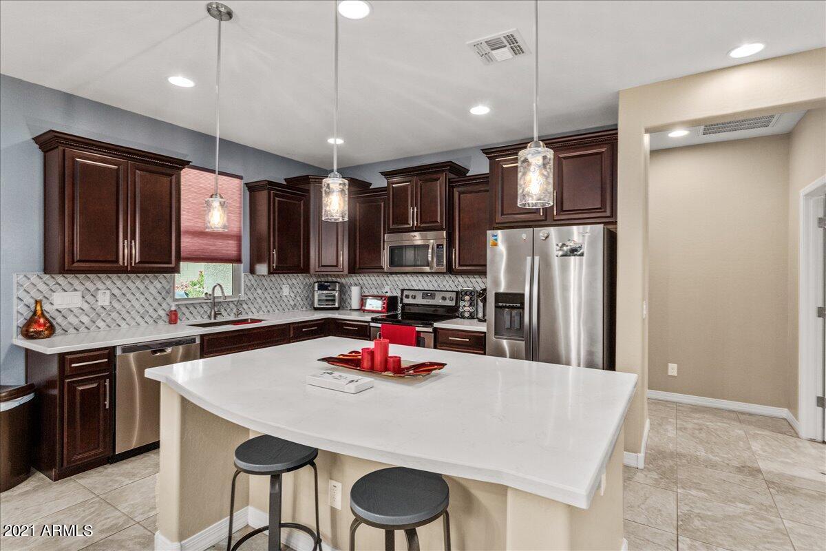 22816 West Moonlight Path Buckeye, AZ 85326 - Photo 9 of 36 09-Kitchen