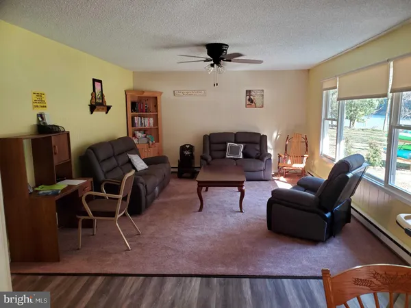 a very nice looking room with a lots of white walls