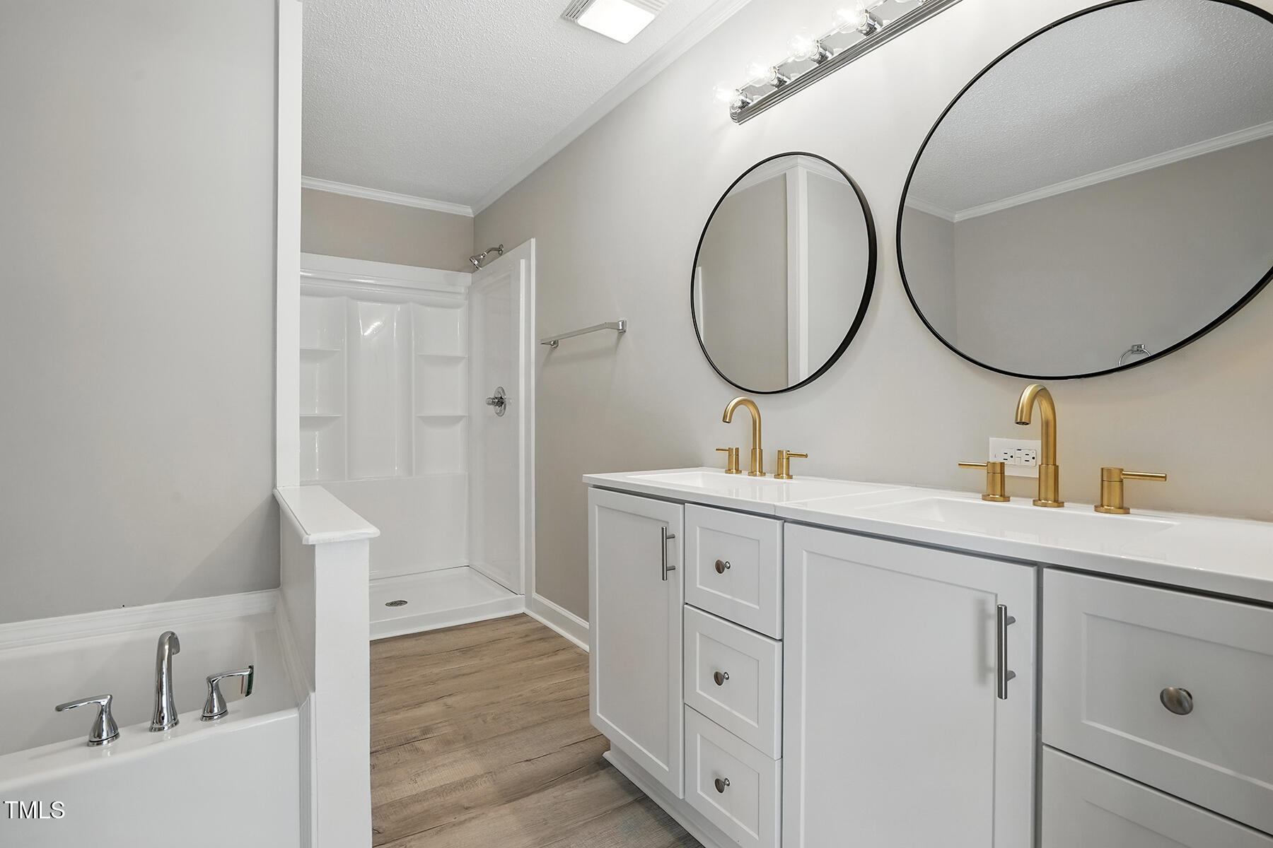 4467 Virgilina Road Roxboro, NC 27574 - Photo 24 of 30 a bathroom with a sink and a mirror