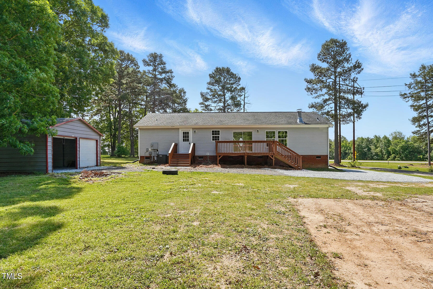 4467 Virgilina Road Roxboro, NC 27574 - Photo 29 of 30 a front view of a house with a garden