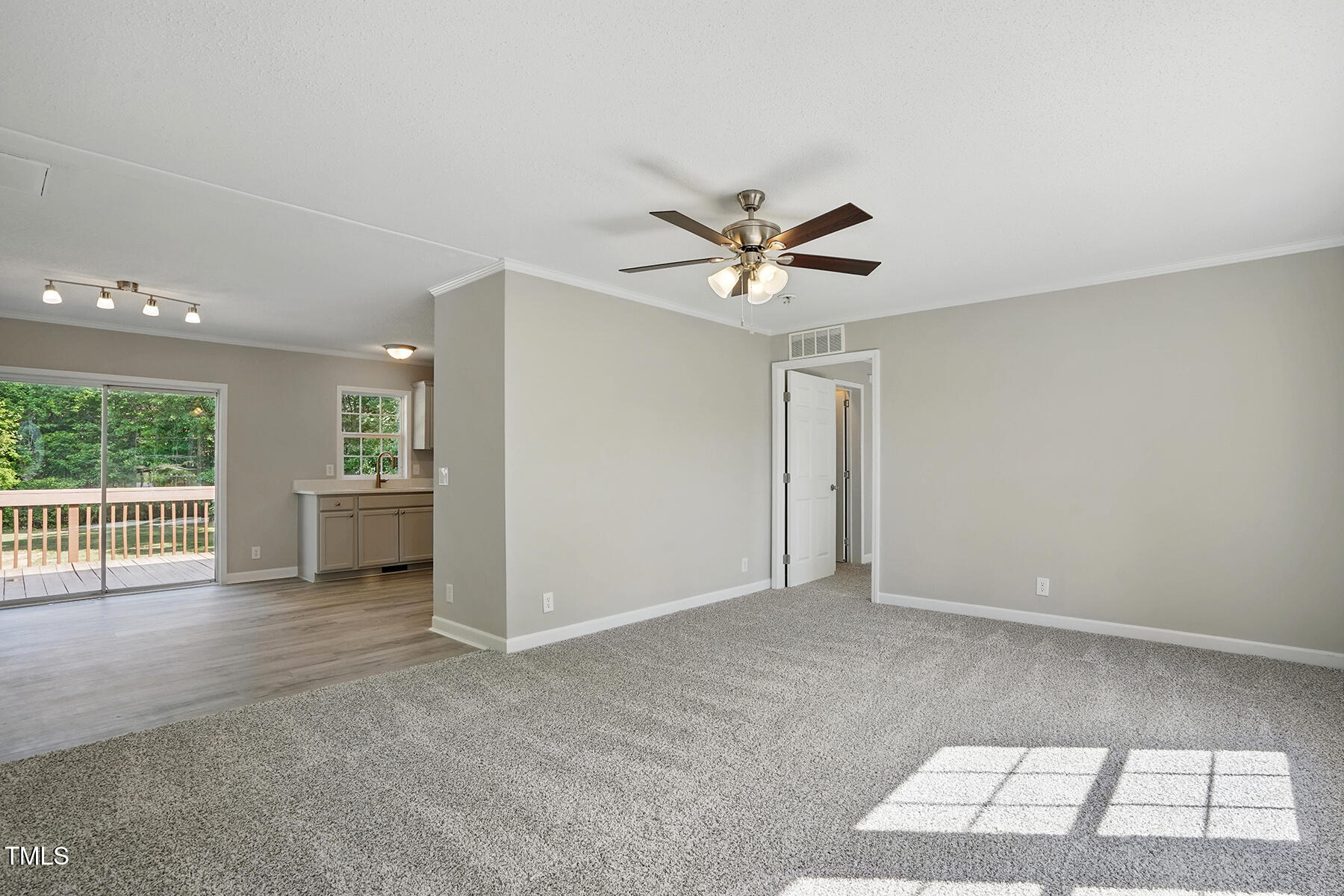 4467 Virgilina Road Roxboro, NC 27574 - Photo 4 of 30 a view of an empty room with a window