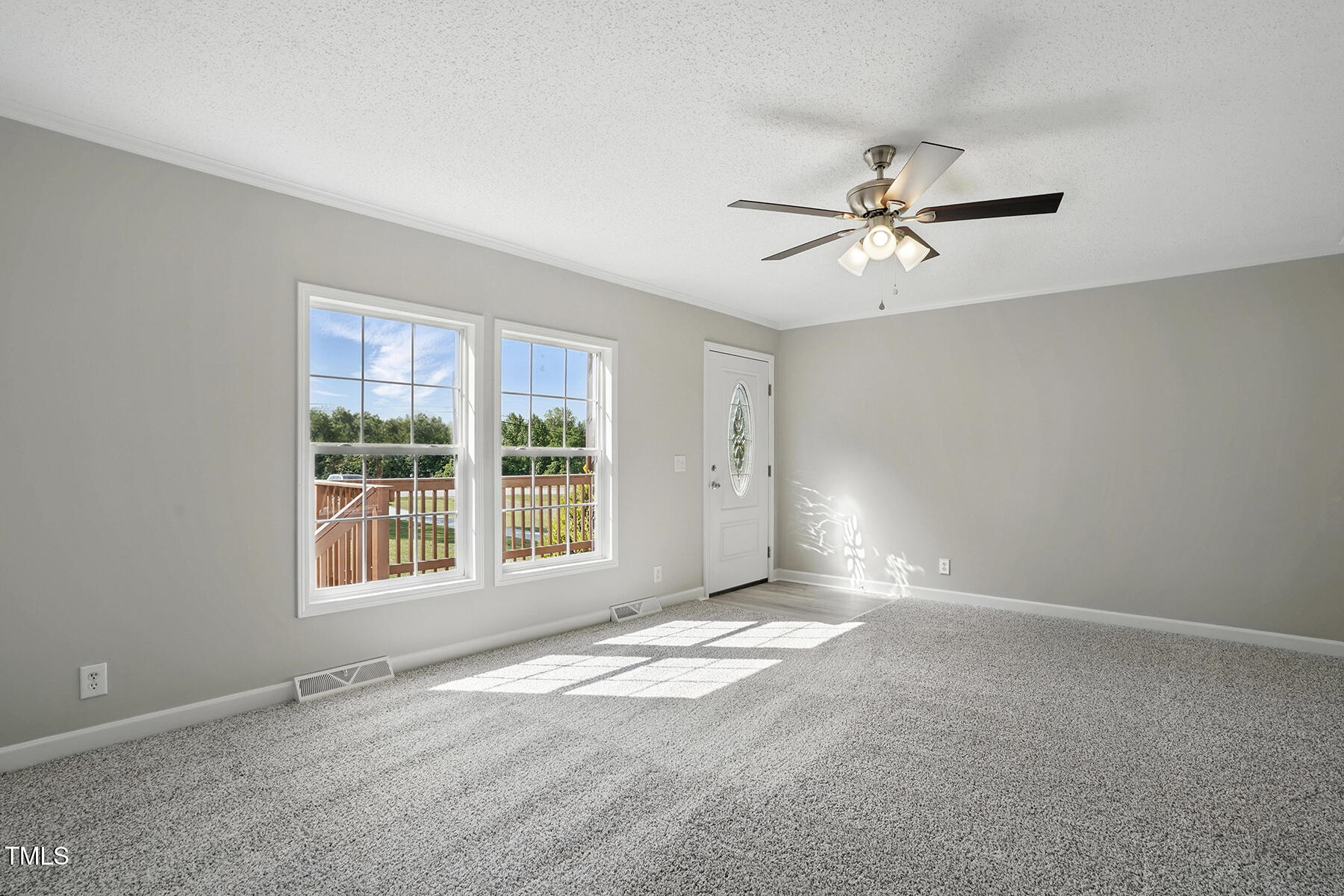 4467 Virgilina Road Roxboro, NC 27574 - Photo 6 of 30 a view of an empty room with a window