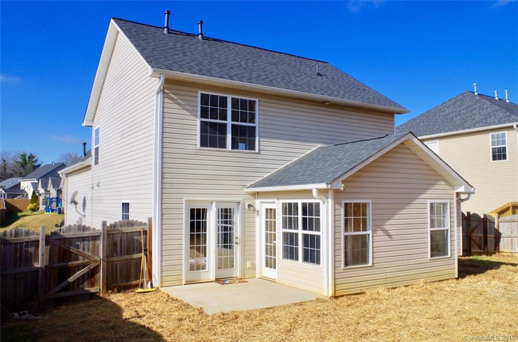 87 Yadkin Road, Unit 327 Fletcher, NC 28732 - Photo 11 of 23 a view of a house with wooden fence