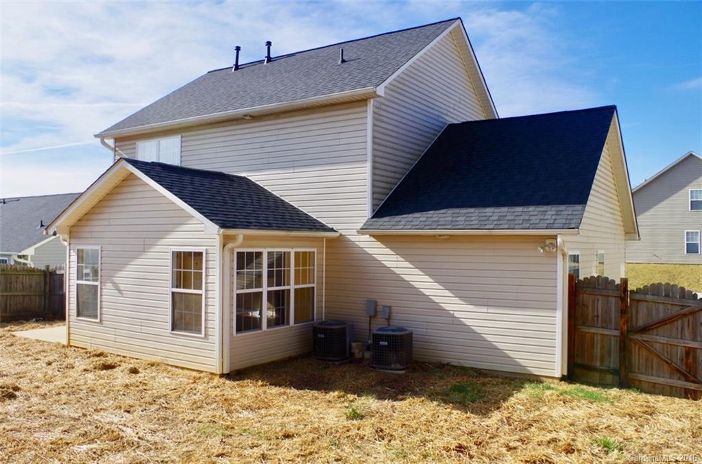 87 Yadkin Road, Unit 327 Fletcher, NC 28732 - Photo 12 of 23 a view of a house with a yard