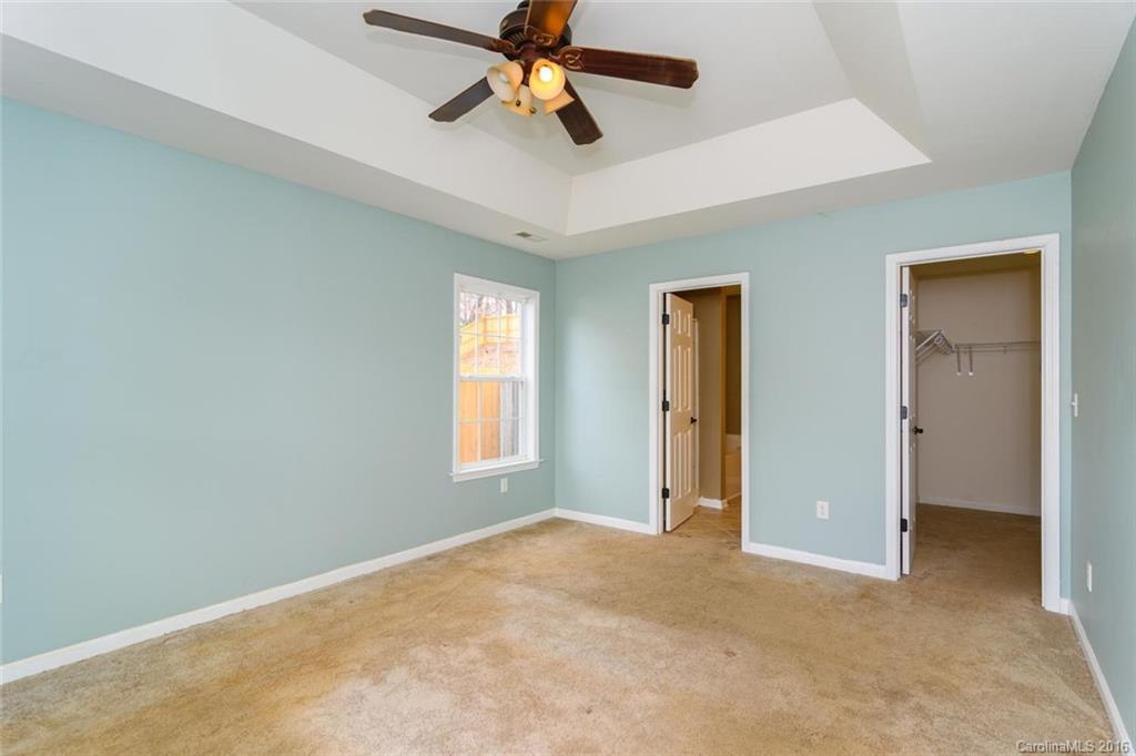 87 Yadkin Road, Unit 327 Fletcher, NC 28732 - Photo 16 of 23 a view of a livingroom with a ceiling fan and window