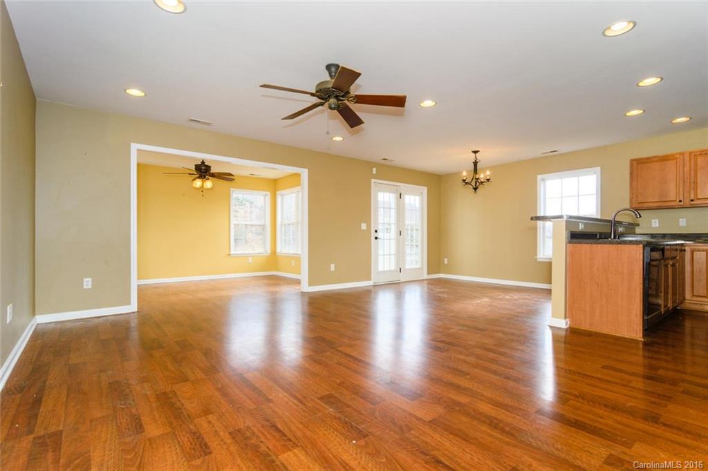 87 Yadkin Road, Unit 327 Fletcher, NC 28732 - Photo 3 of 23 a view of a kitchen with a sink and a window