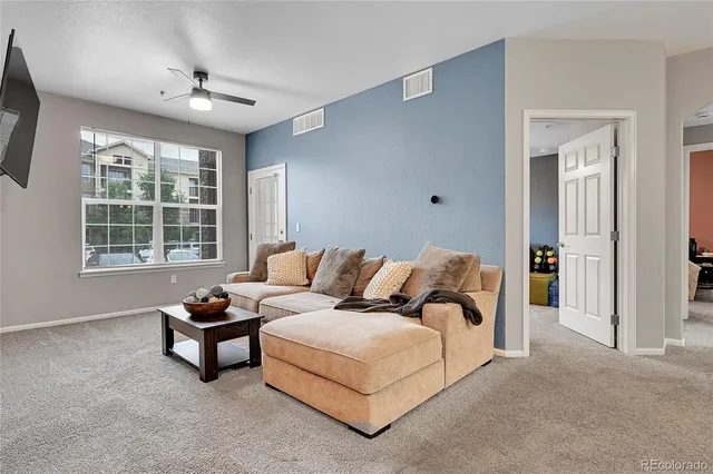 a bed room with a bed and a couch