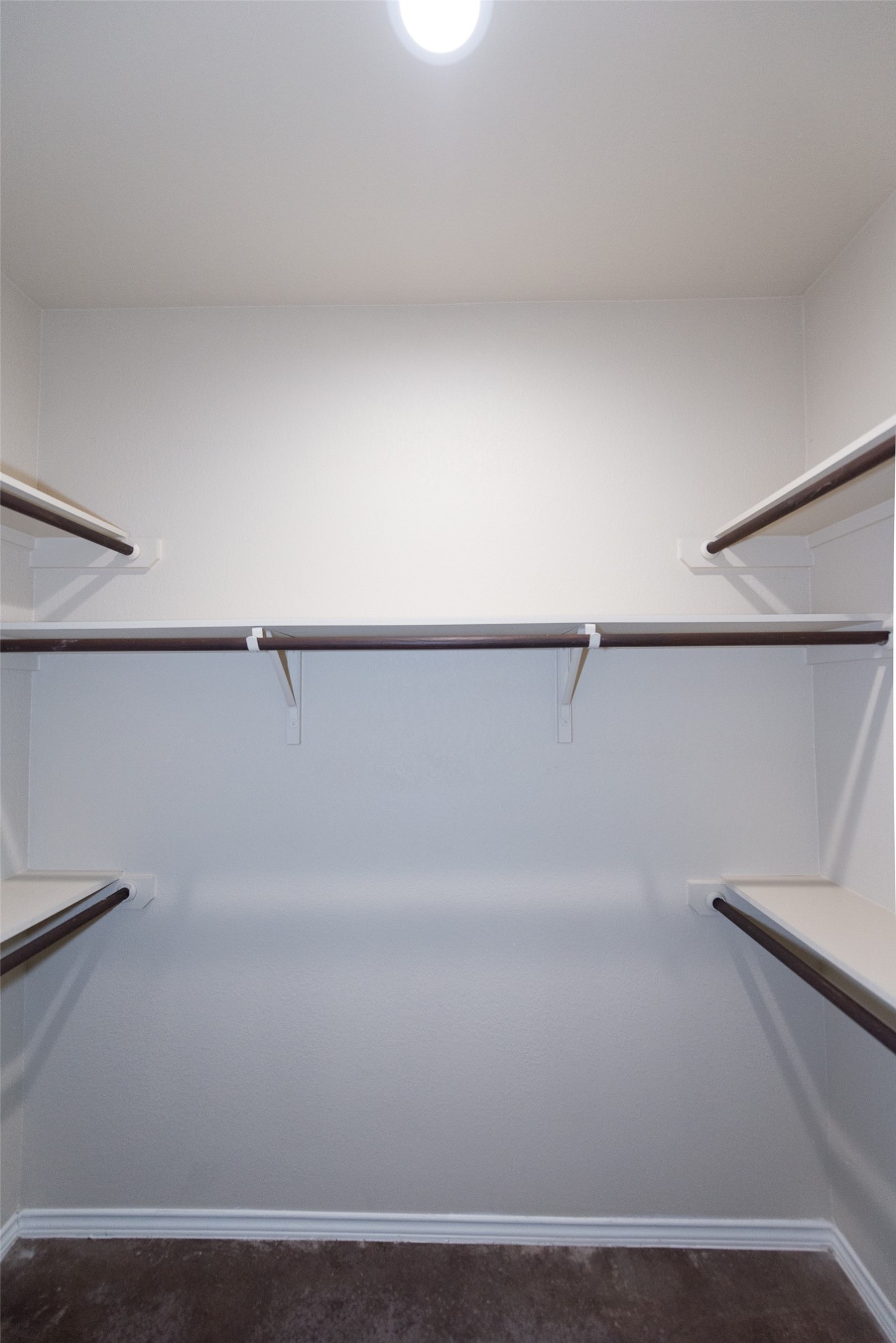 245 Joanne Loop, Unit B Buda, TX 78610 - Photo 24 of 33 Primary bedroom walk in closet