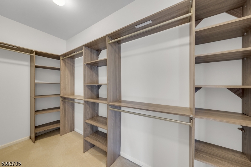 805 Deluca Road, Unit 805 Belleville, NJ 07109 - Photo 28 of 35 a view of an empty walk in closet