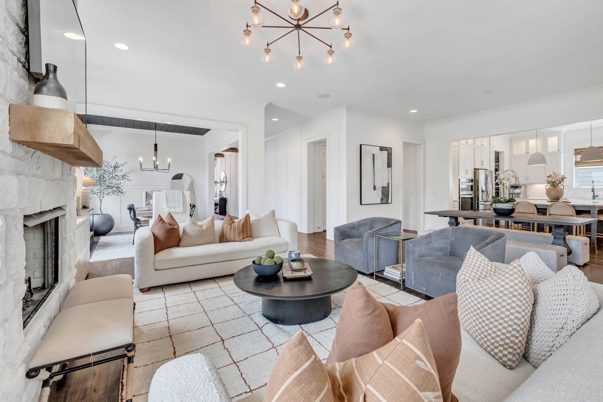 400 Dewar Drive Franklin, TN 37064 - Photo 13 of 64 a living room with furniture a rug and a chandelier