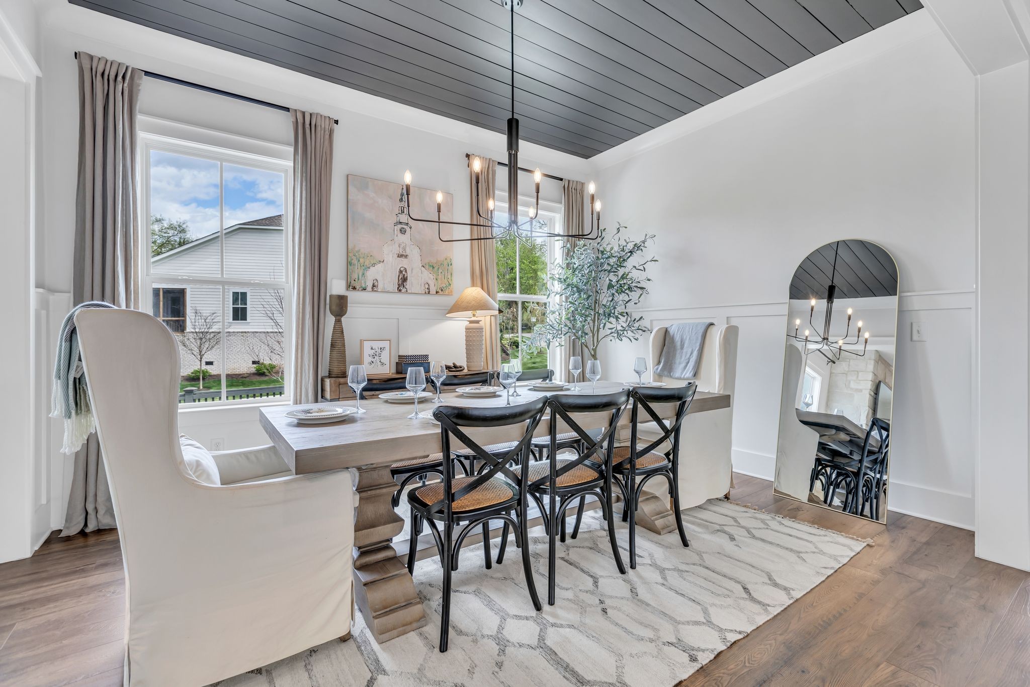 400 Dewar Drive Franklin, TN 37064 - Photo 22 of 64 a dining room with furniture a chandelier and wooden floor