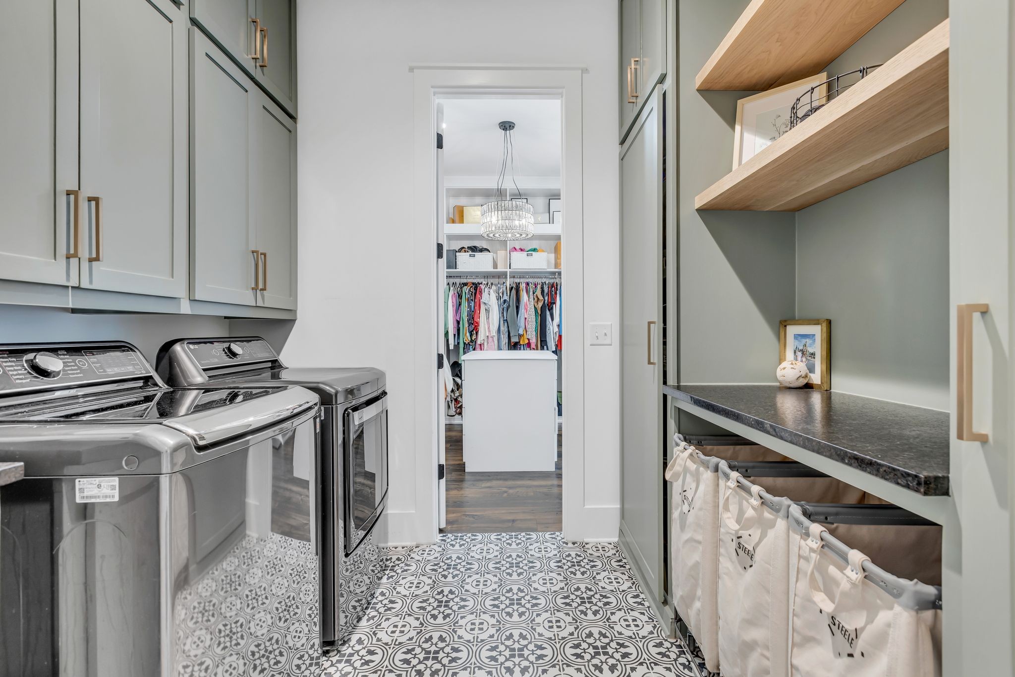 400 Dewar Drive Franklin, TN 37064 - Photo 29 of 64 a kitchen with stainless steel appliances granite countertop a stove and a refrigerator