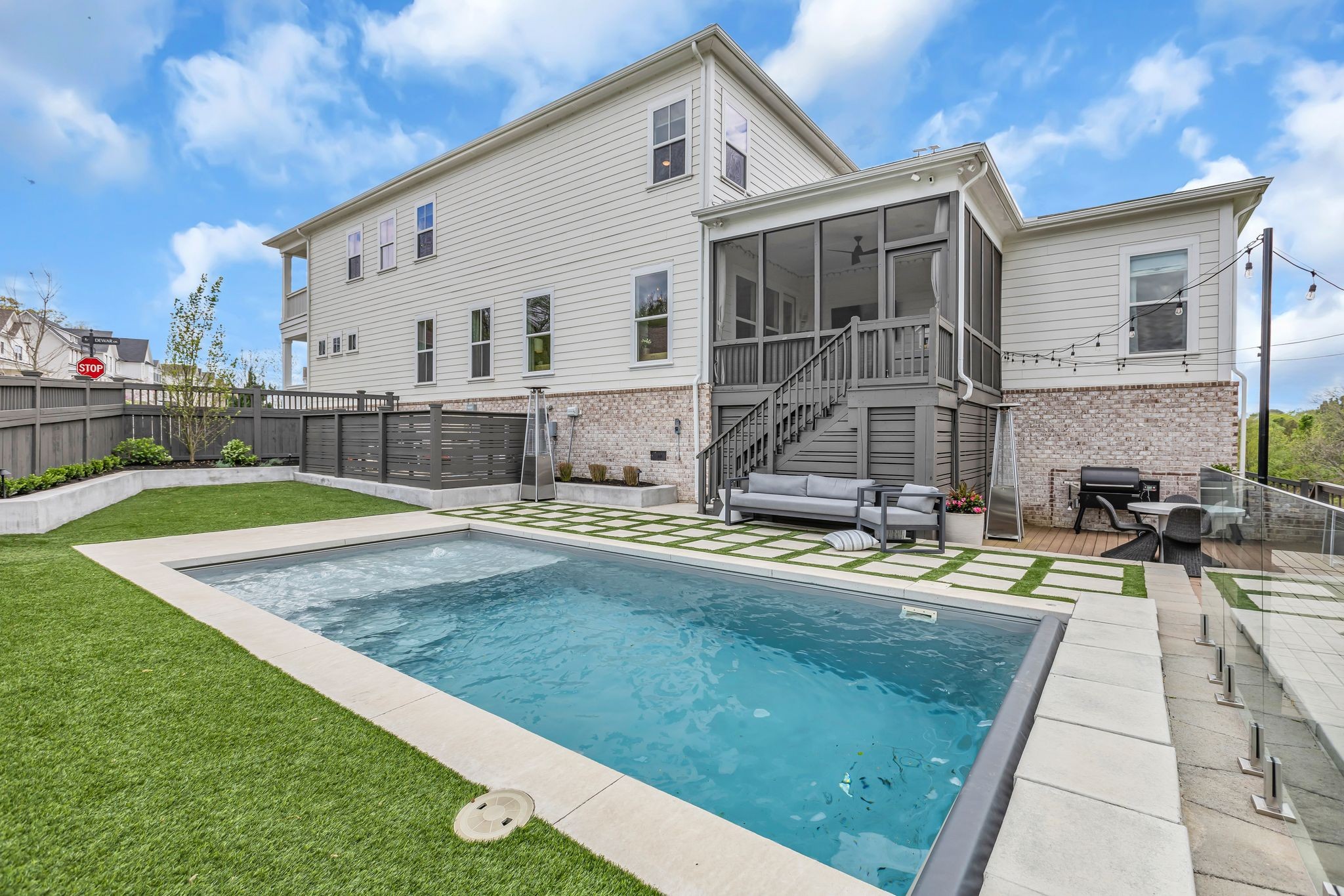 400 Dewar Drive Franklin, TN 37064 - Photo 46 of 64 a view of a house with swimming pool and sitting area