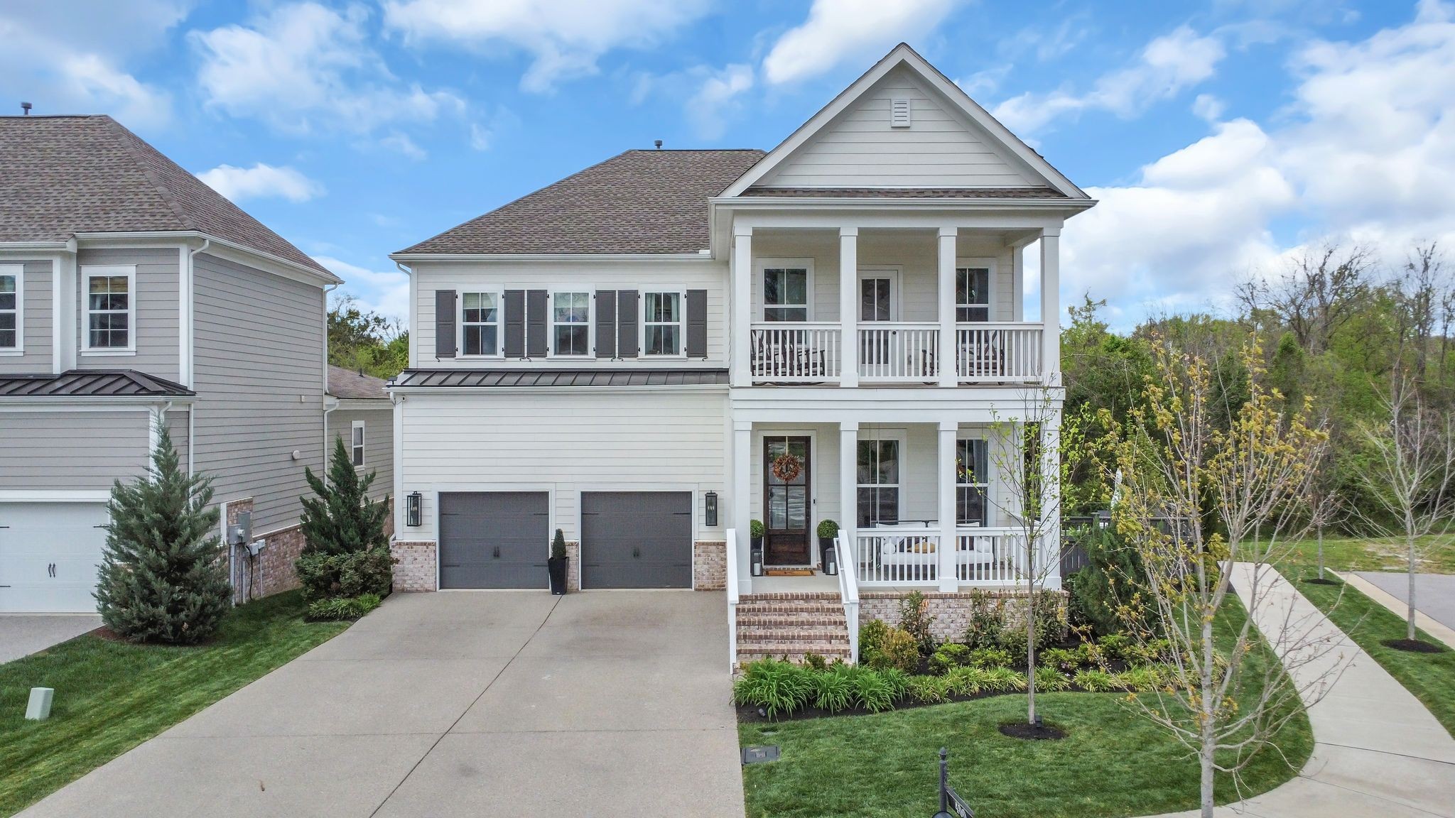 400 Dewar Drive Franklin, TN 37064 - Photo 52 of 64 a front view of a house with a garden and yard