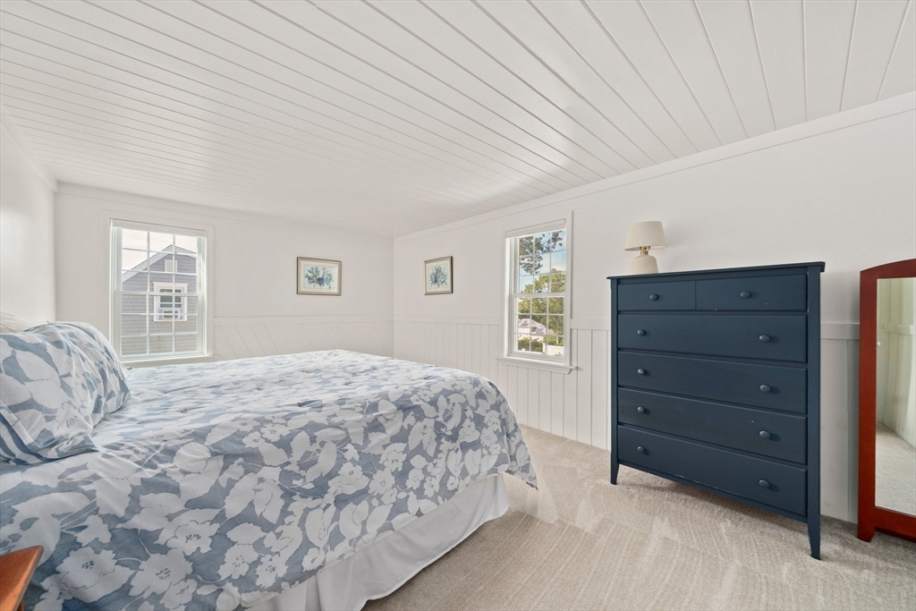 103 Williston Road Bourne, MA 02562 - Photo 18 of 40 a bedroom with a bed and a window