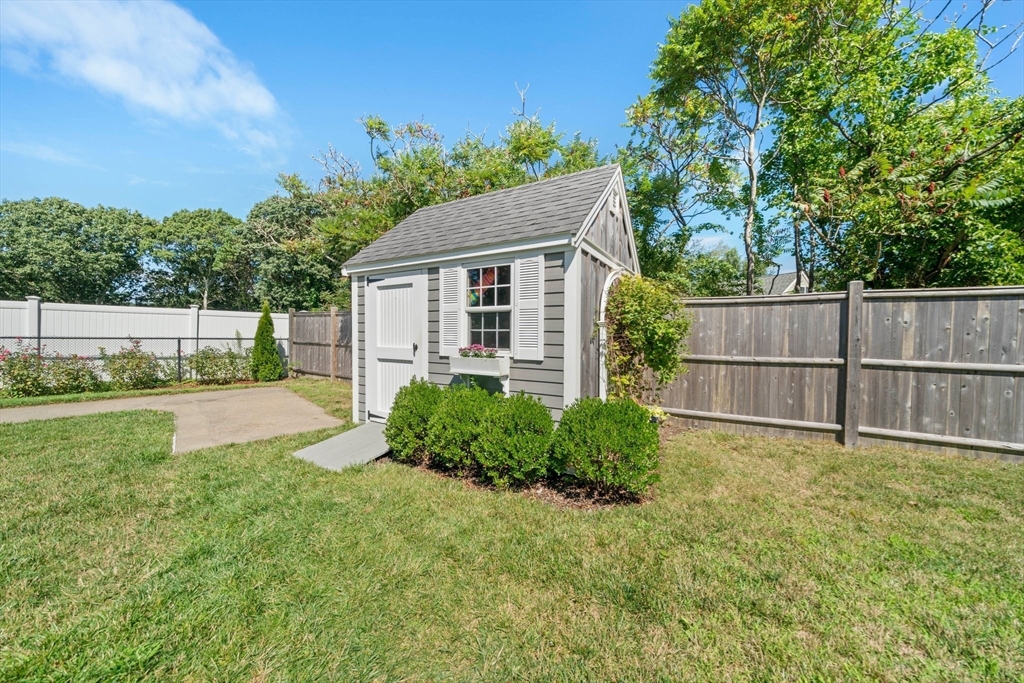 103 Williston Road Bourne, MA 02562 - Photo 32 of 40 a view of backyard with green space