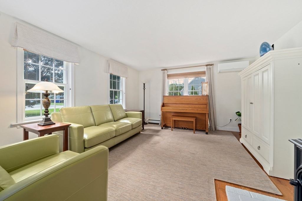 103 Williston Road Bourne, MA 02562 - Photo 8 of 40 a living room with furniture and a window