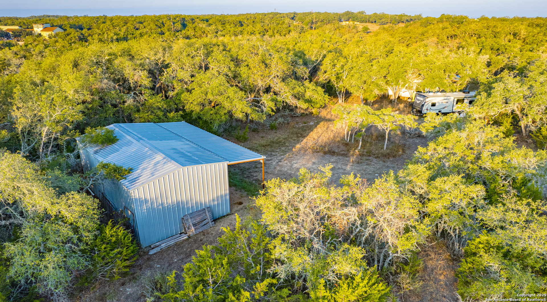 184 Peyton Colony Road Blanco, TX 78606 - Photo 13 of 33 a view of a yard in front of the tree