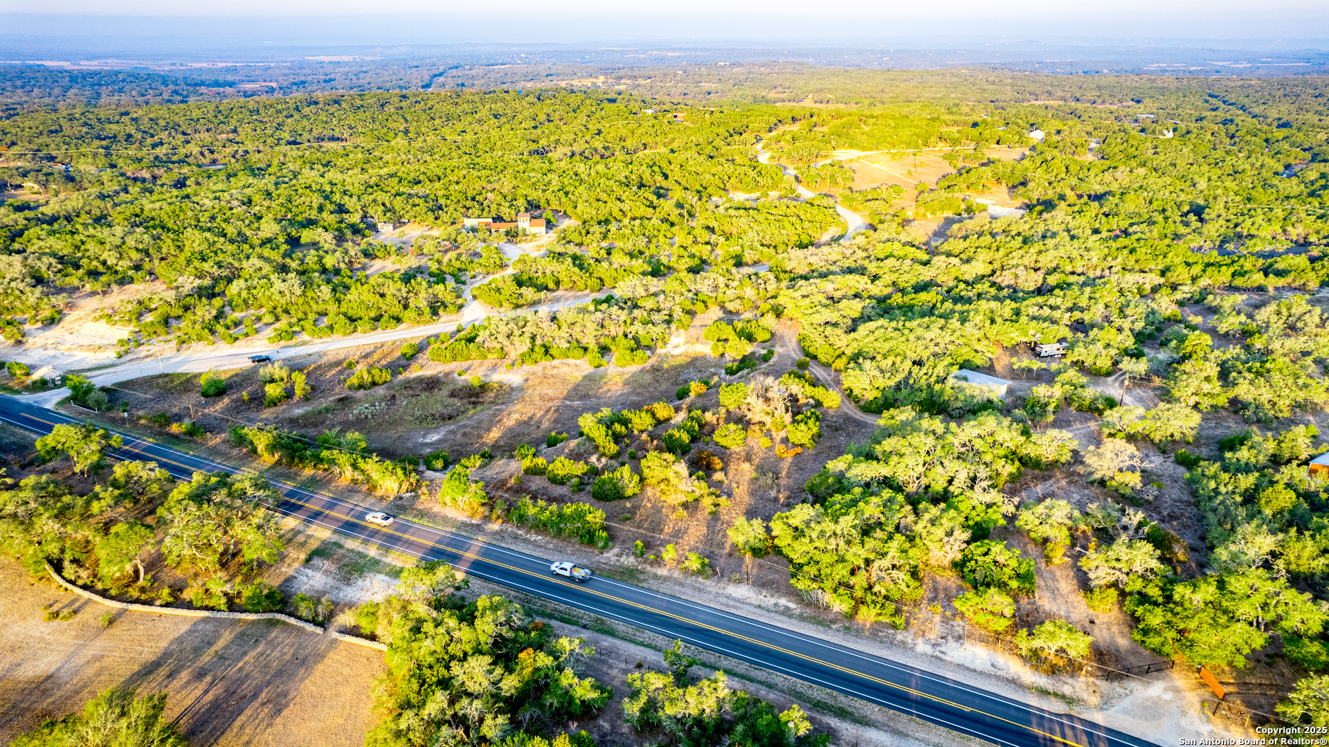 184 Peyton Colony Road Blanco, TX 78606 - Photo 24 of 33 a view of an outdoor space and a lake view