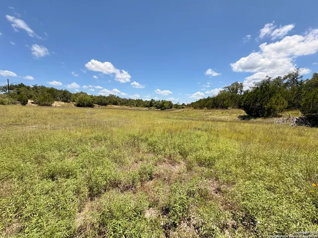 a view of an ocean and city