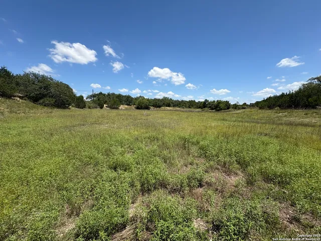 a view of an ocean and a yard