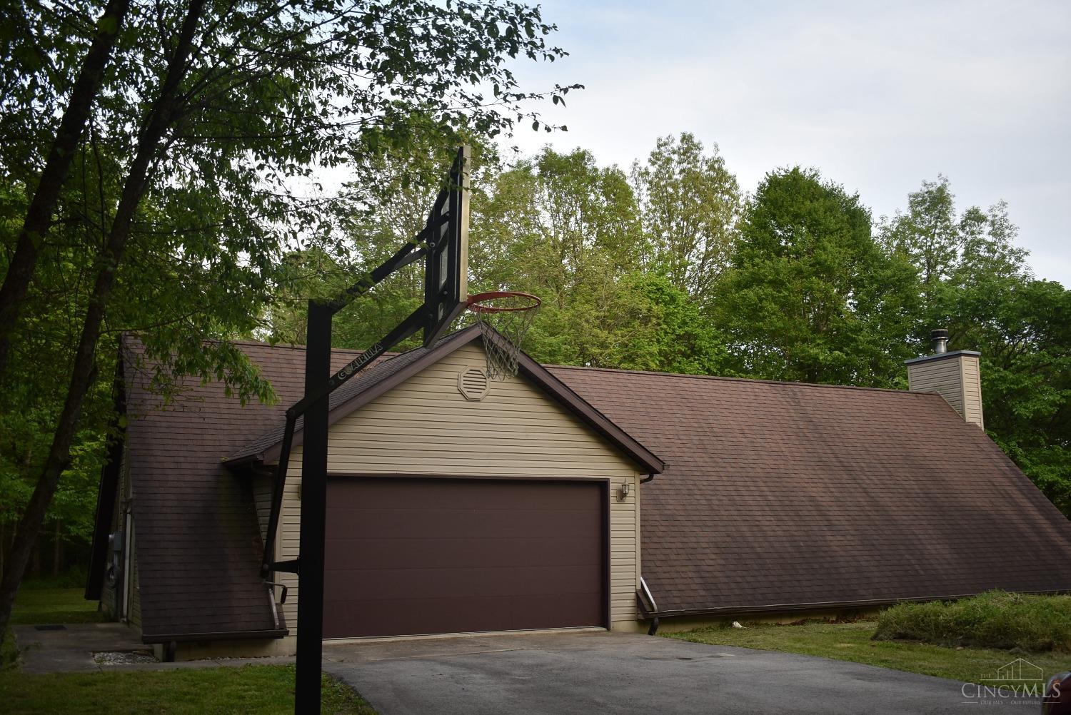 10600 Springer Road Hillsboro, OH 45133 - Photo 5 of 38 As you drive down the blacktop drive you will be amazed at this unique amazing home