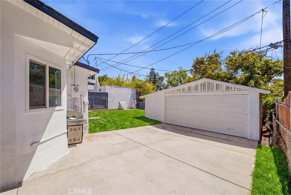 1280 East Woodbury Road Pasadena, CA 91104 - Photo 39 of 40 a view of a house with a garage