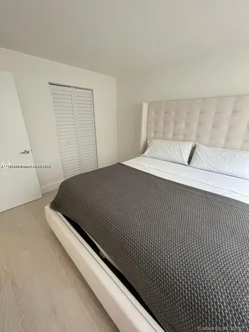 a bedroom with a bed