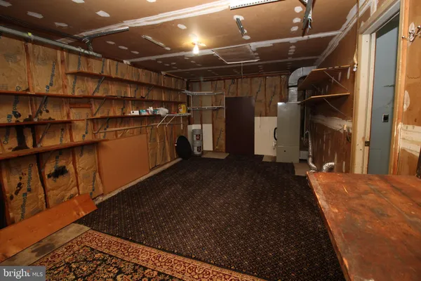 a view of storage and utility room