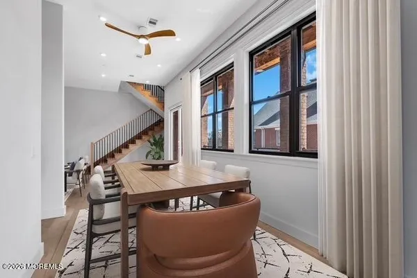 a workspace with furniture and window