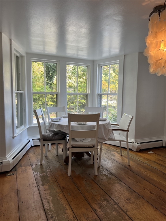 2019 Main Street Brewster, MA 02631 - Photo 13 of 17 a workspace with wooden floor and windows