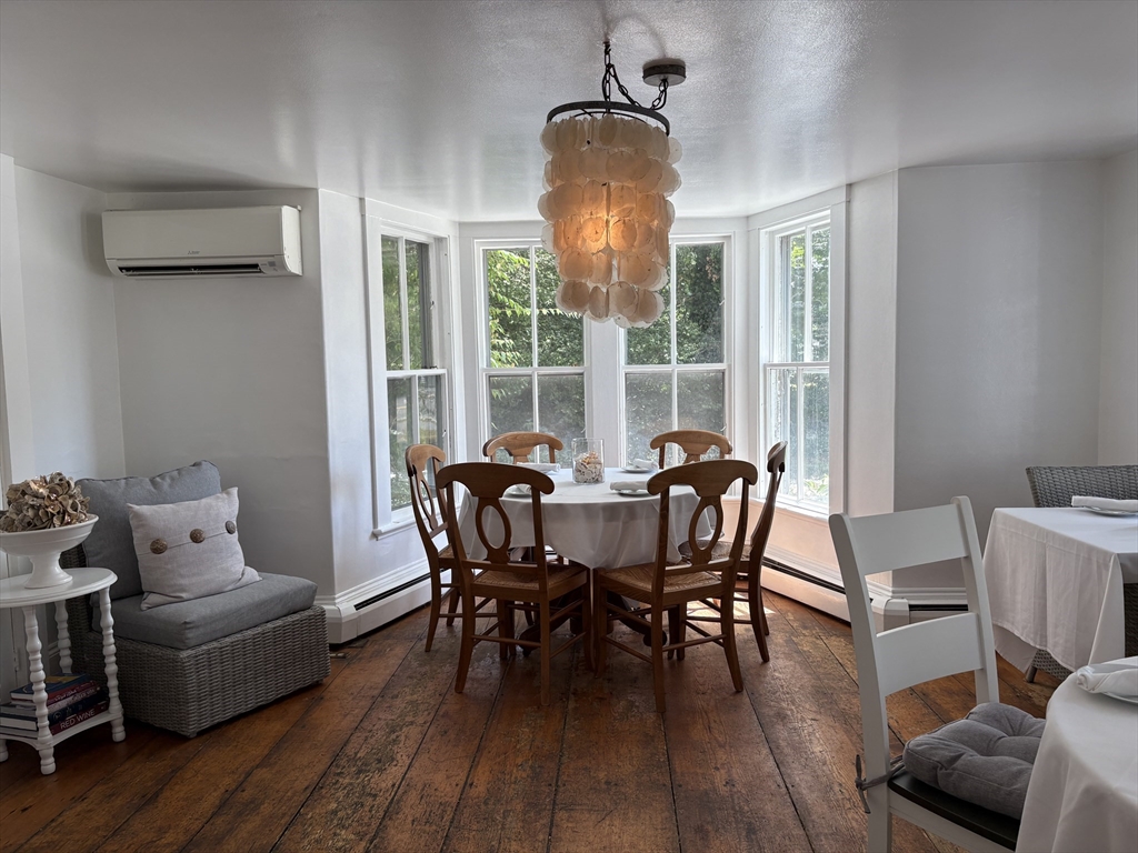 2019 Main Street Brewster, MA 02631 - Photo 16 of 17 a view of a dining room with furniture window and outside view