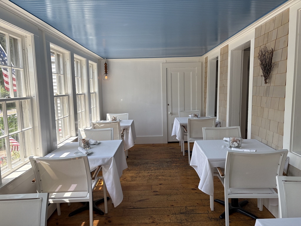 2019 Main Street Brewster, MA 02631 - Photo 17 of 17 a view of a dining room with furniture and window