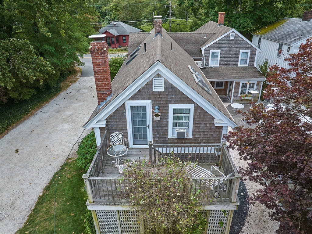 2019 Main Street Brewster, MA 02631 - Photo 5 of 17 a front view of a house with garden