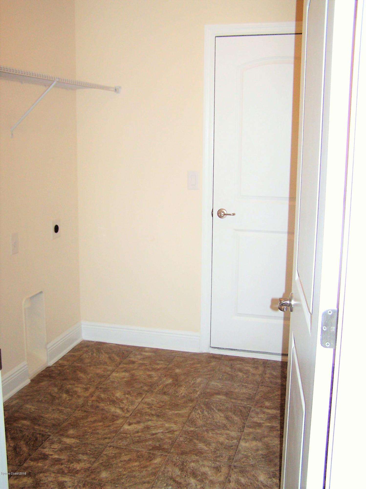 1539 Summit Road Palm Bay, FL 32909 - Photo 14 of 18 Inside Laundry