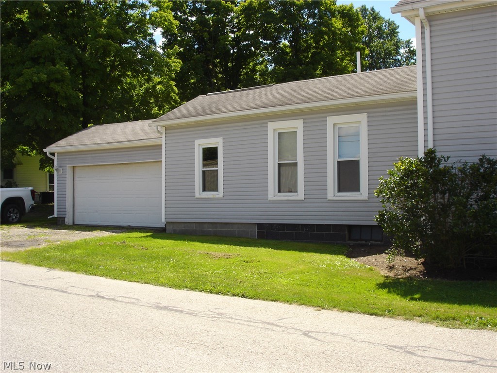 77 South Maple State Road Orwell, OH 44076 - Photo 27 of 30 Parking and garage off of High St.