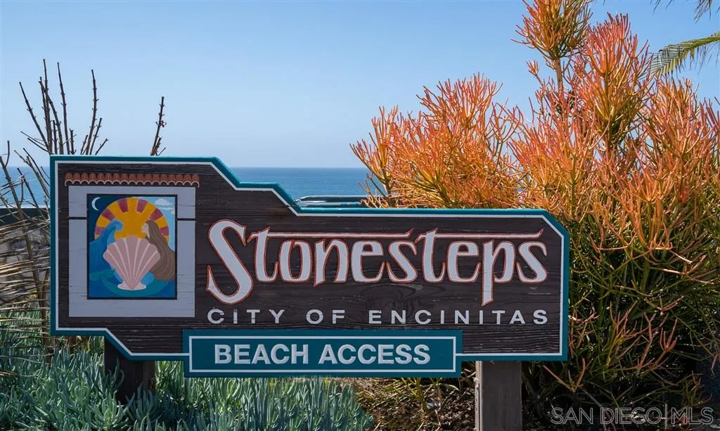 330 Neptune Avenue Encinitas, CA 92024 - Photo 13 of 13 a street sign that is on a pole