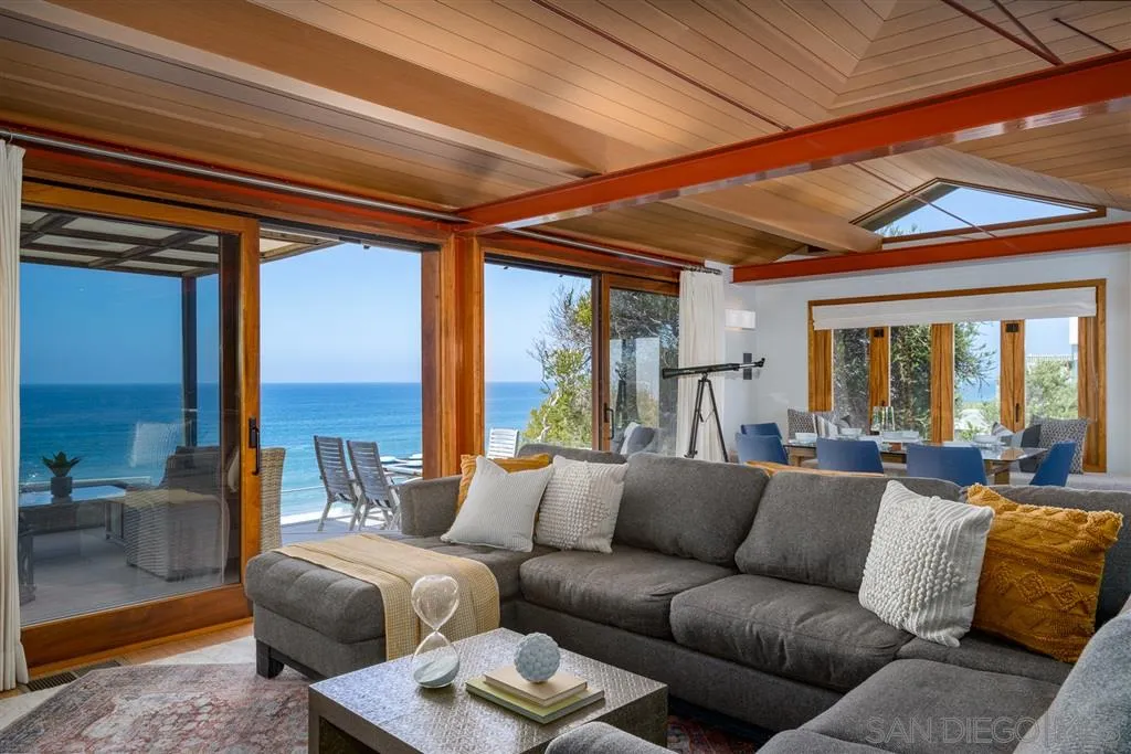 330 Neptune Avenue Encinitas, CA 92024 - Photo 4 of 13 a living room with furniture and a large window
