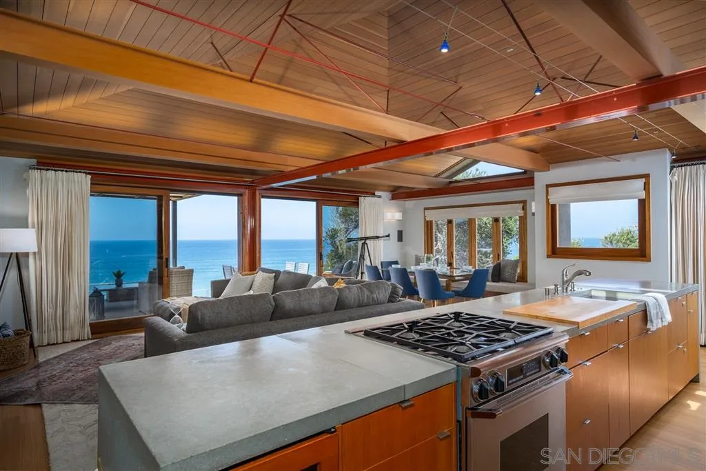 330 Neptune Avenue Encinitas, CA 92024 - Photo 6 of 13 a living room with furniture and a table