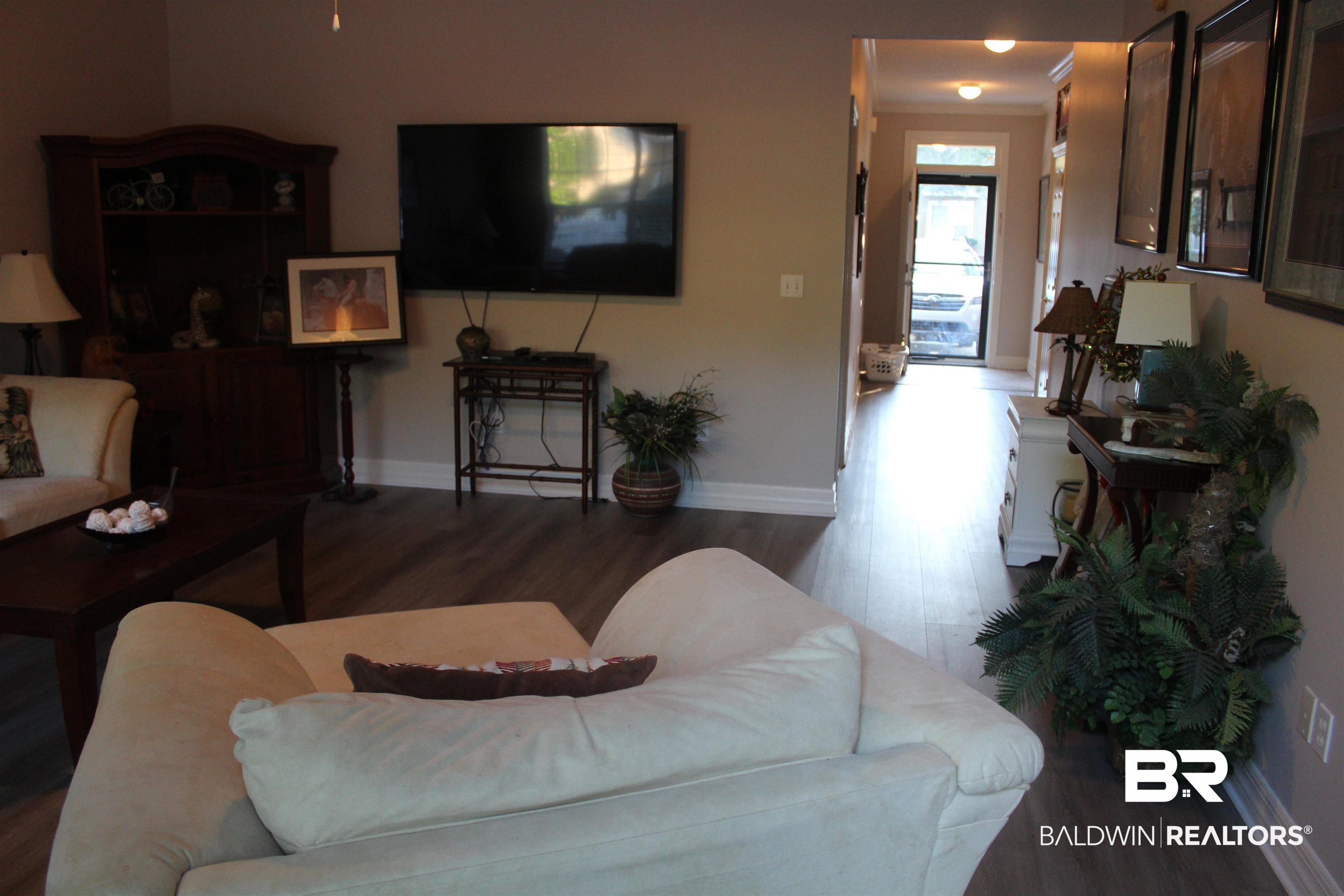 Living room featuring hardwood / wood-style flooring