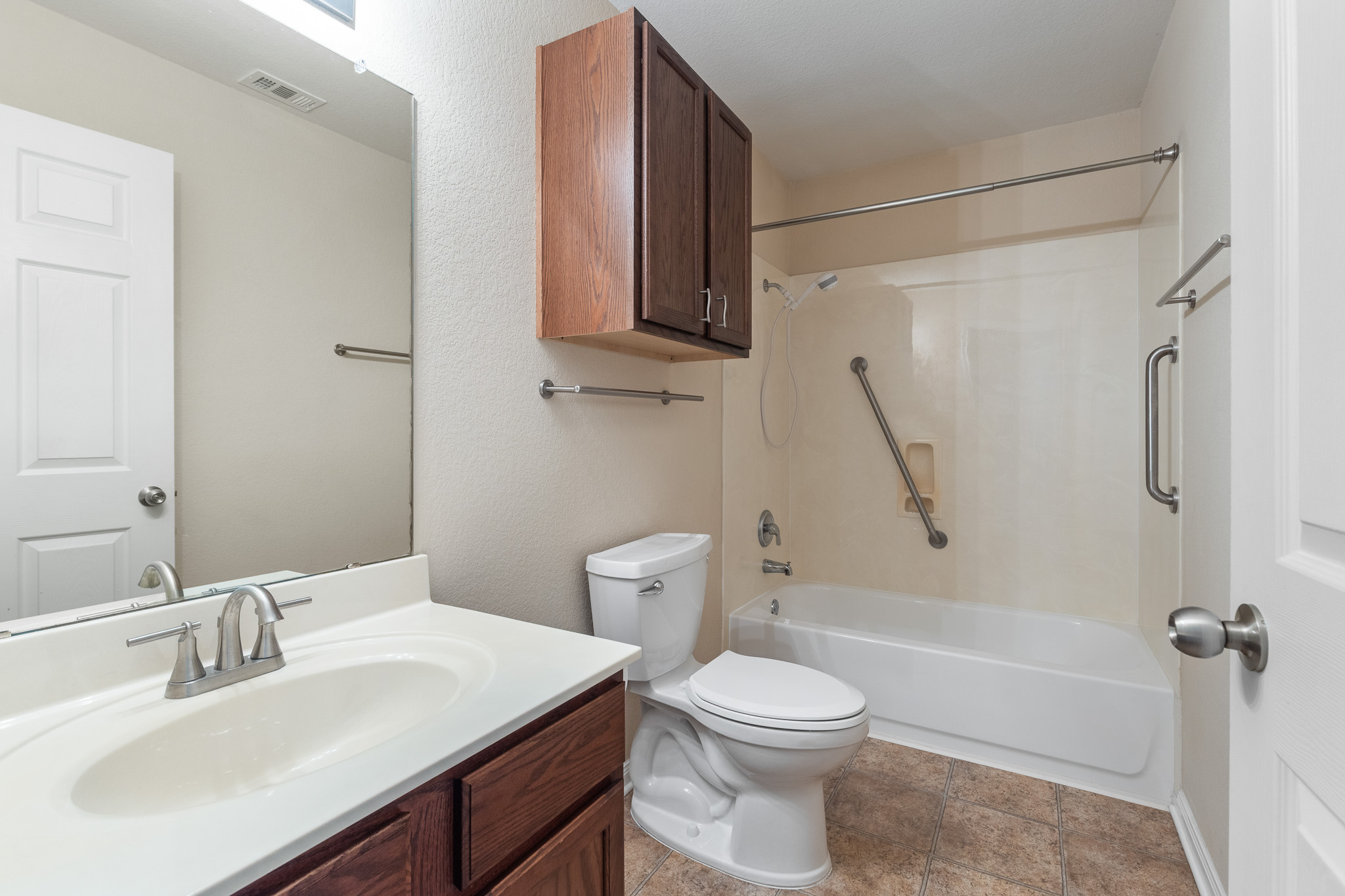 11400 Ashbrook Drive Manchaca, TX 78652 - Photo 22 of 32 a bathroom with a sink toilet and shower