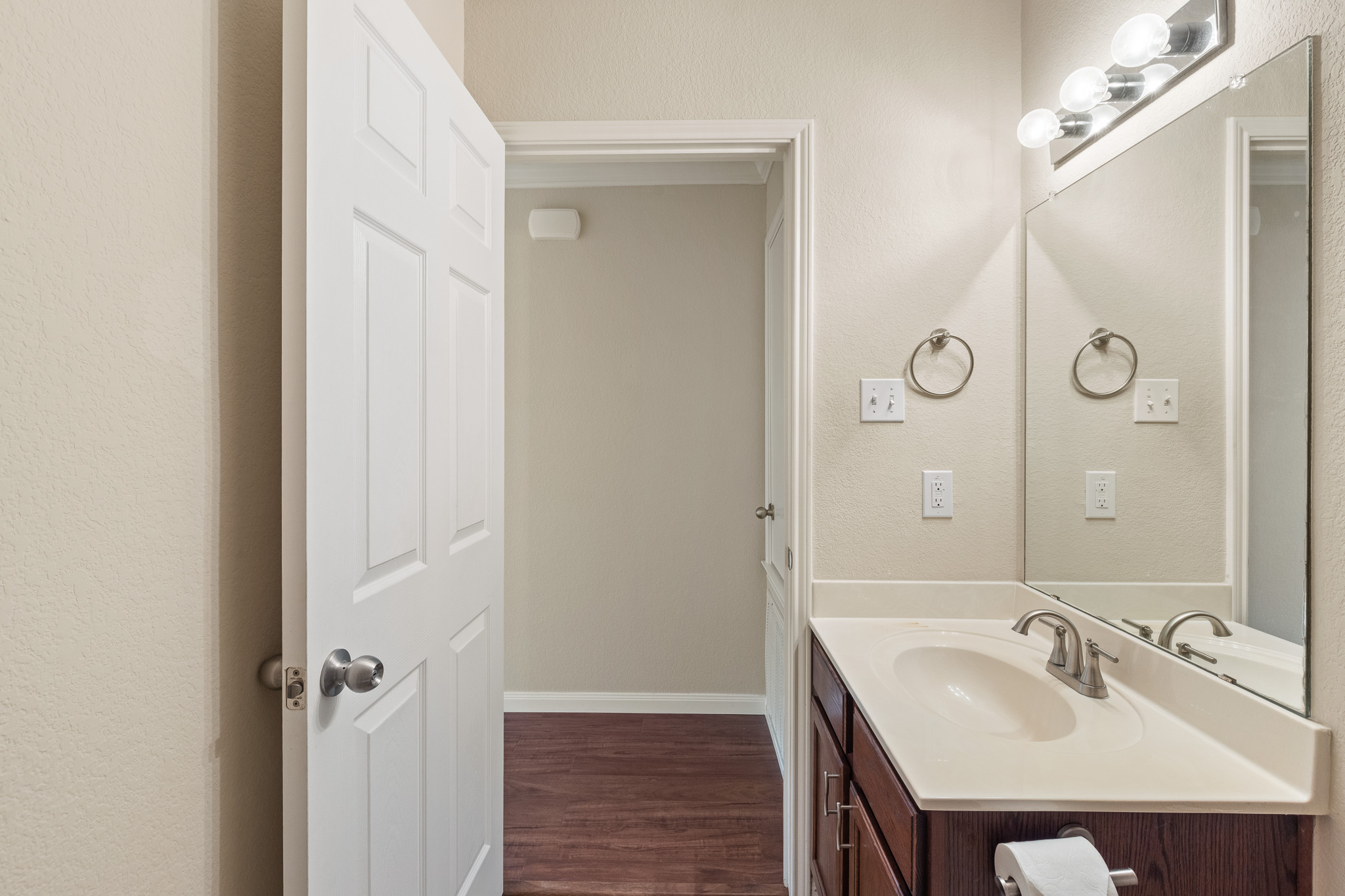 11400 Ashbrook Drive Manchaca, TX 78652 - Photo 23 of 32 a bathroom with a sink and a mirror