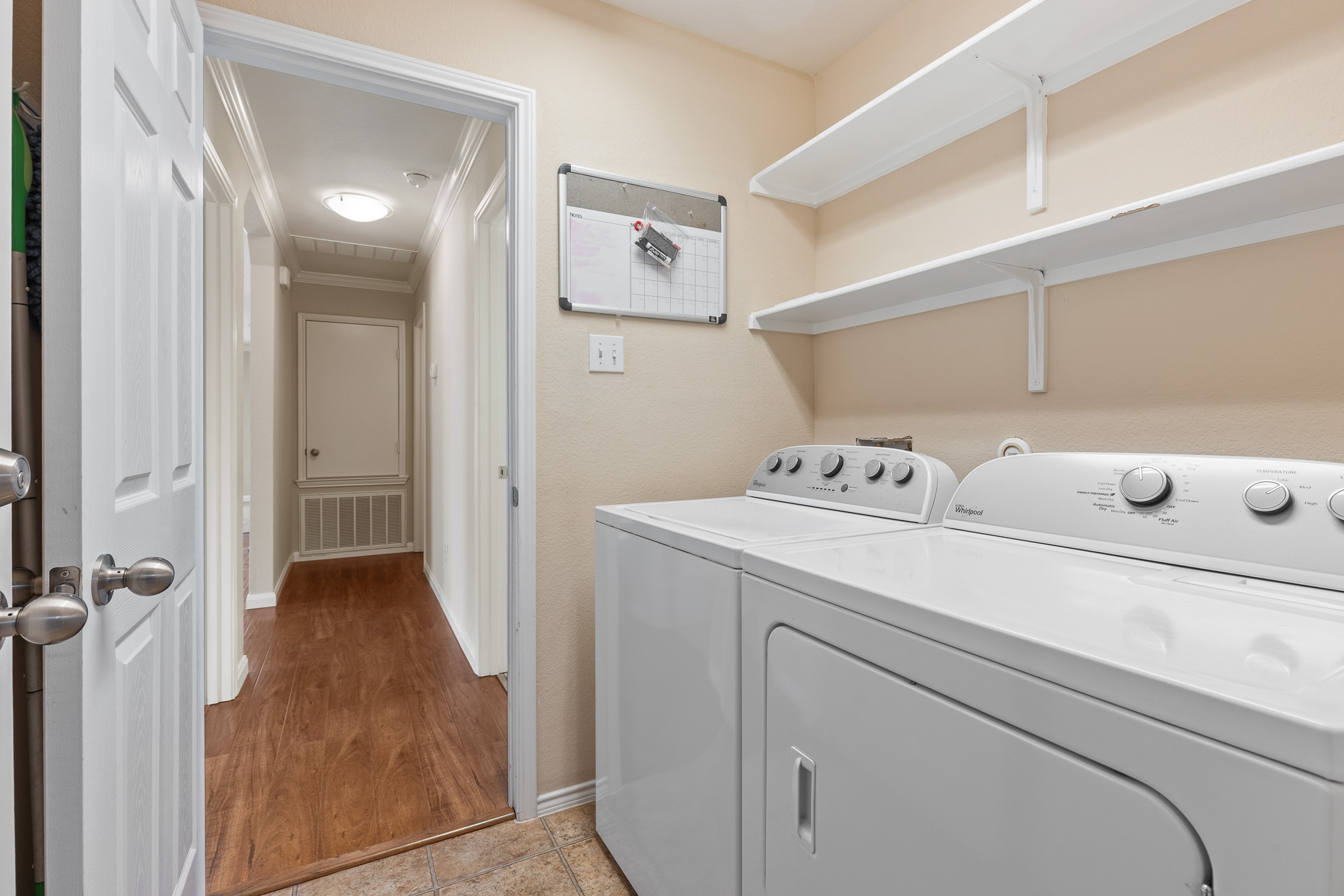 11400 Ashbrook Drive Manchaca, TX 78652 - Photo 27 of 32 a utility room with dryer and washer