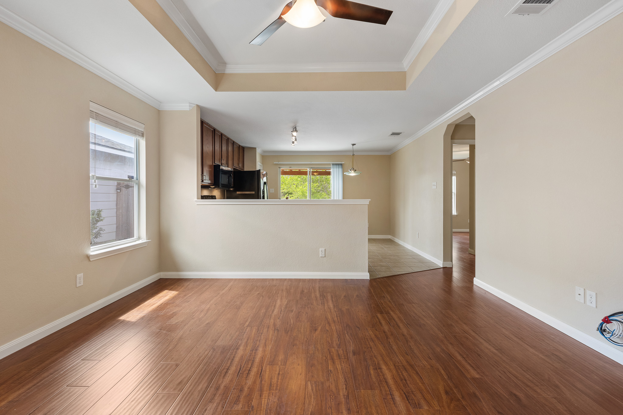 11400 Ashbrook Drive Manchaca, TX 78652 - Photo 8 of 32 a view of empty room with wooden floor and window