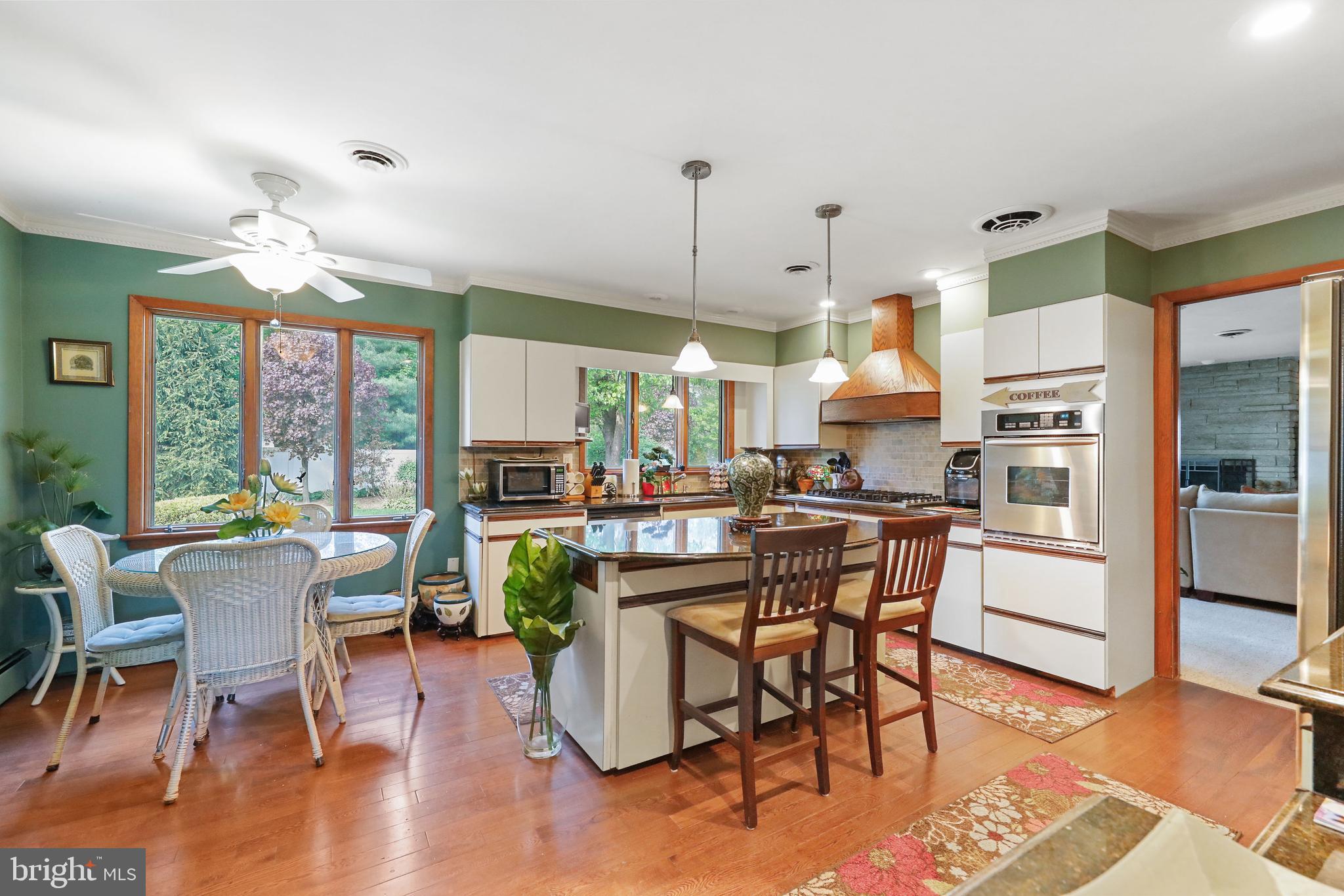 19 Diane Drive Ewing, NJ 08628 - Photo 12 of 38 a view of a dining room with furniture window and wooden floor